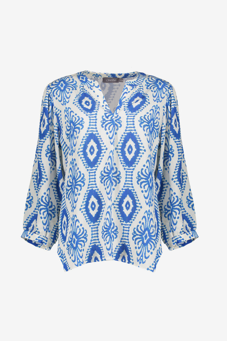Geisha dames top met V-hals en sierlijke Ikat print