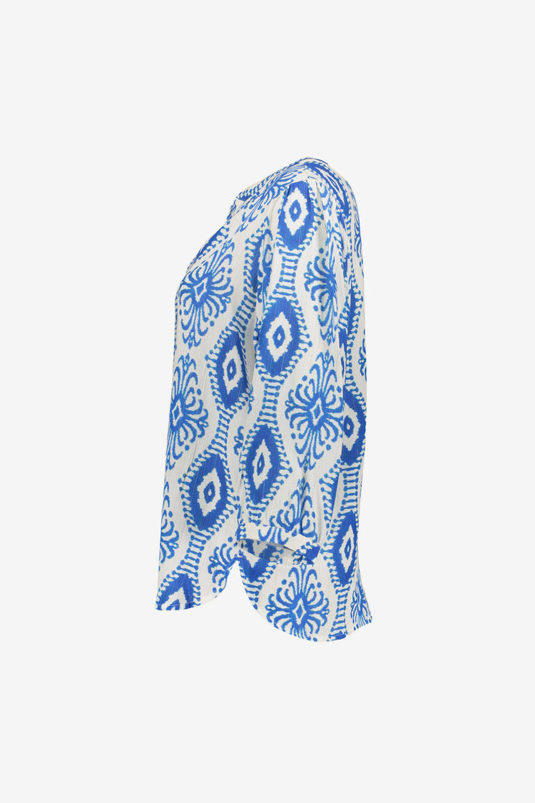 Geisha dames top met V-hals en sierlijke Ikat print