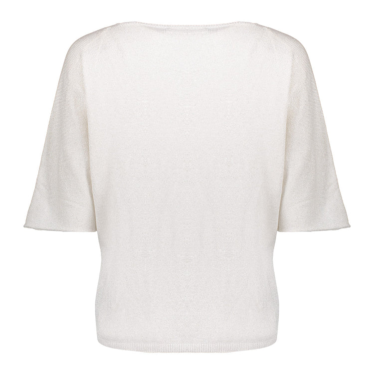 Geisha Fashion label on plain white short-sleeved knit top.