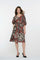 Geisha Fashion: Floral-patterned dress with puff sleeves, isolated background.
