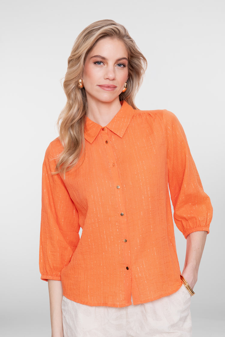 Orangefarbene Geisha-Bluse mit Lurex und auffälligen Knöpfen