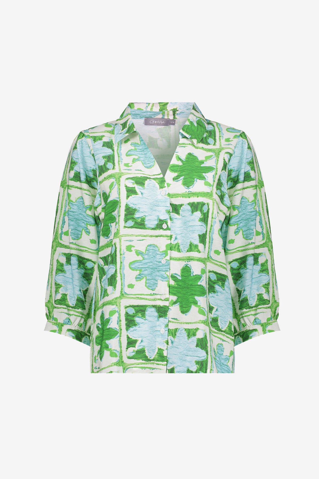 Geisha Bluse mit Fliesenprint und sanften Grüntönen