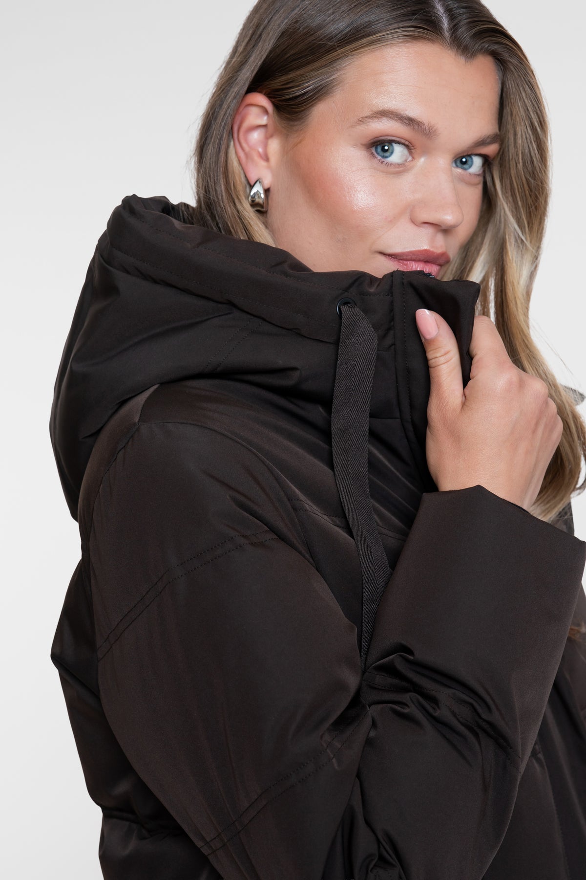 Geisha lange gesteppte Winterjacke mit Kapuze und verdecktem Reißverschluss